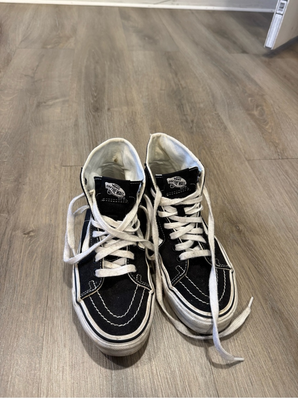 Vans Black and White High-Top Skate Sneakers